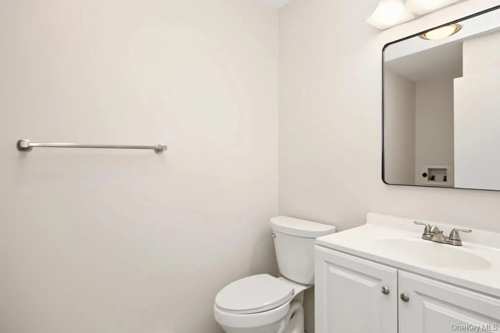 First Floor Powder Room w/hook-up ready for stacked washer/dryer First Floor Powder Room w/hook-up ready for stacked washer/dryer