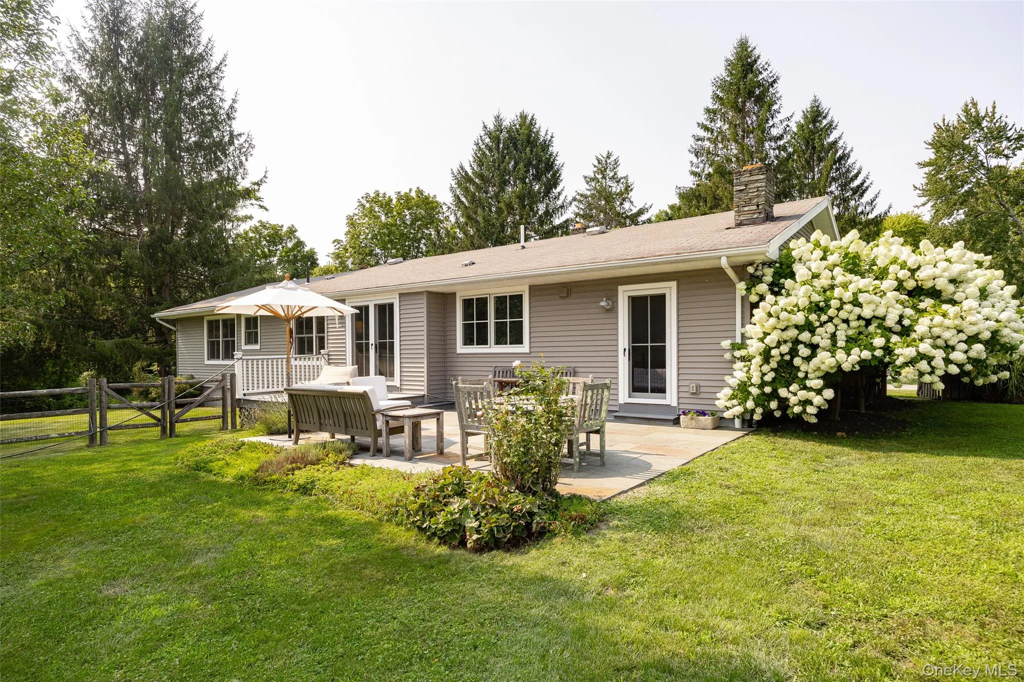 back of house with patio and deck back of house with patio and deck