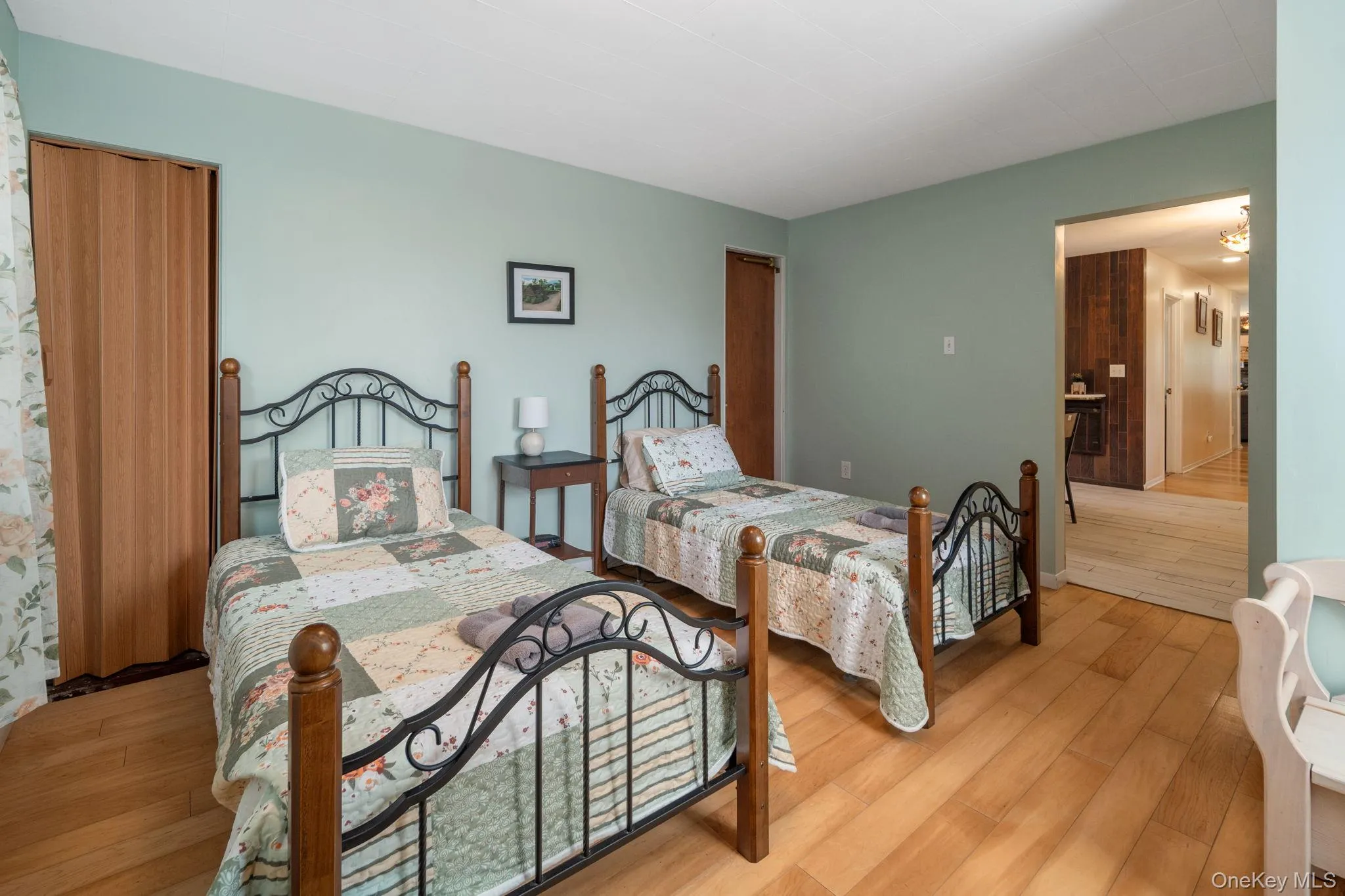 Light wood-finish flooring with a neutral wall color Light wood-finish flooring with a neutral wall color