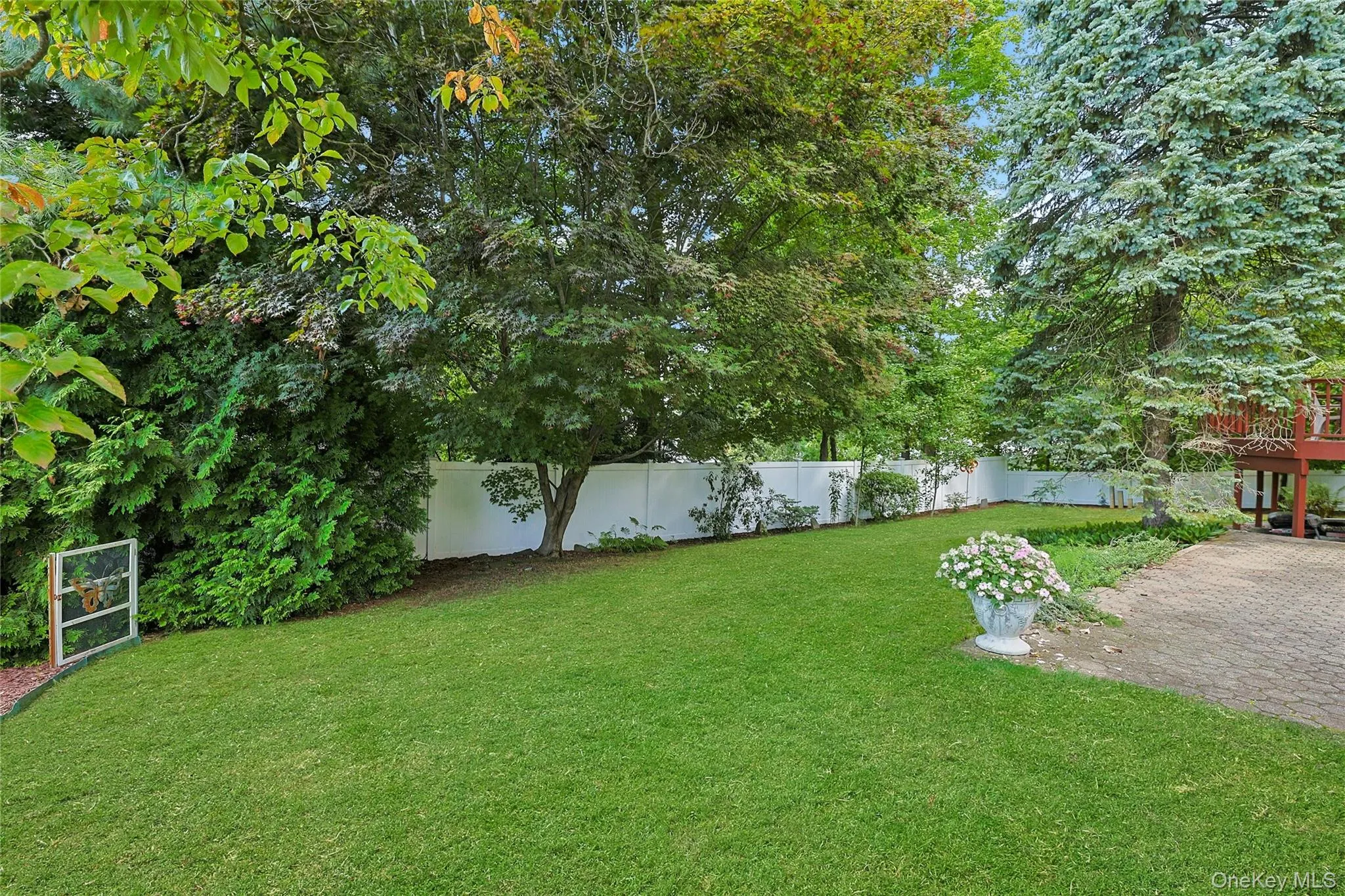Expansive fully fenced in backyard with mature trees and established shrubbery giving you plenty of privacy. Expansive fully fenced in backyard with mature trees and established shrubbery giving you plenty of privacy.