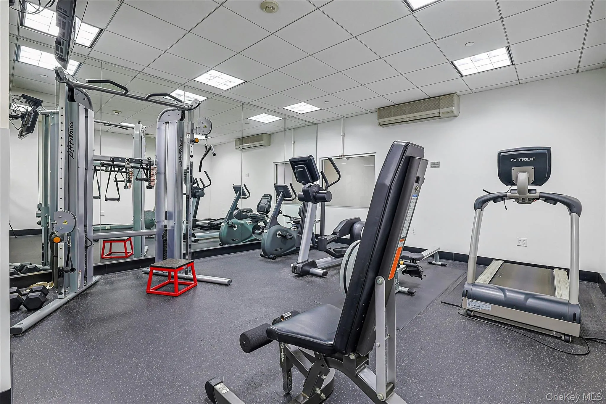 On-site fitness center equipped with cardio and strength-training equipment. On-site fitness center equipped with cardio and strength-training equipment.