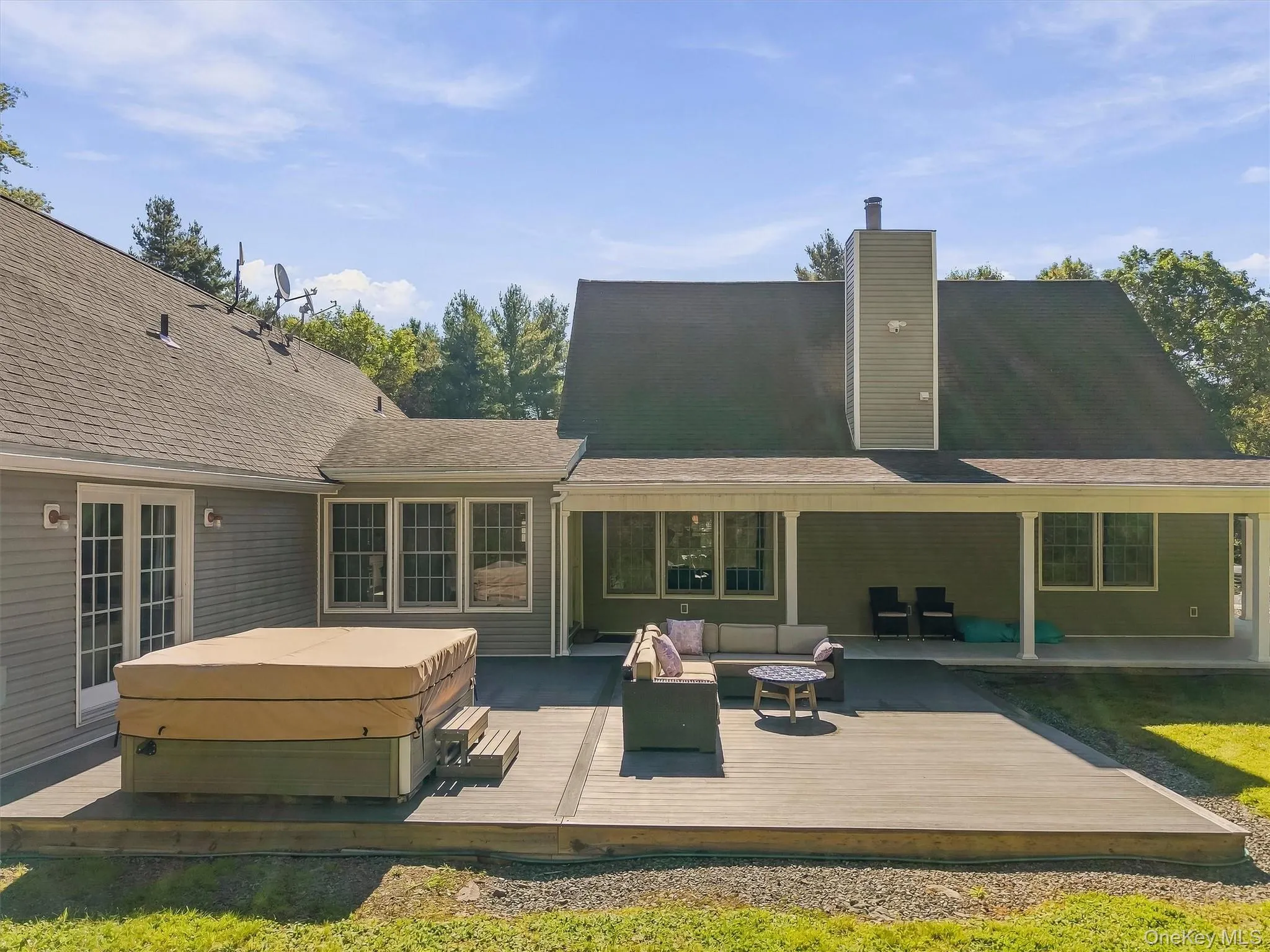 back yard deck with hot tub and lounge area back yard deck with hot tub and lounge area
