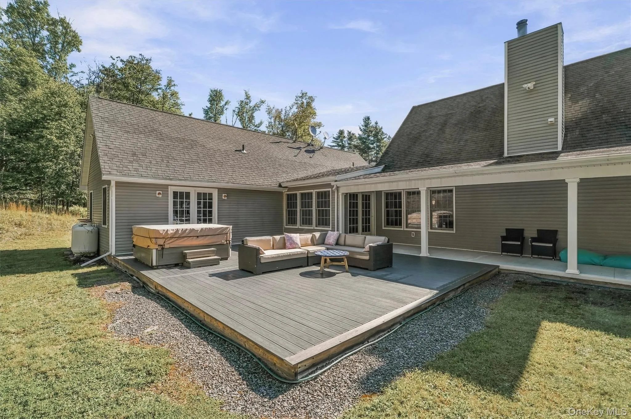 back yard deck with hot tub and lounge area back yard deck with hot tub and lounge area