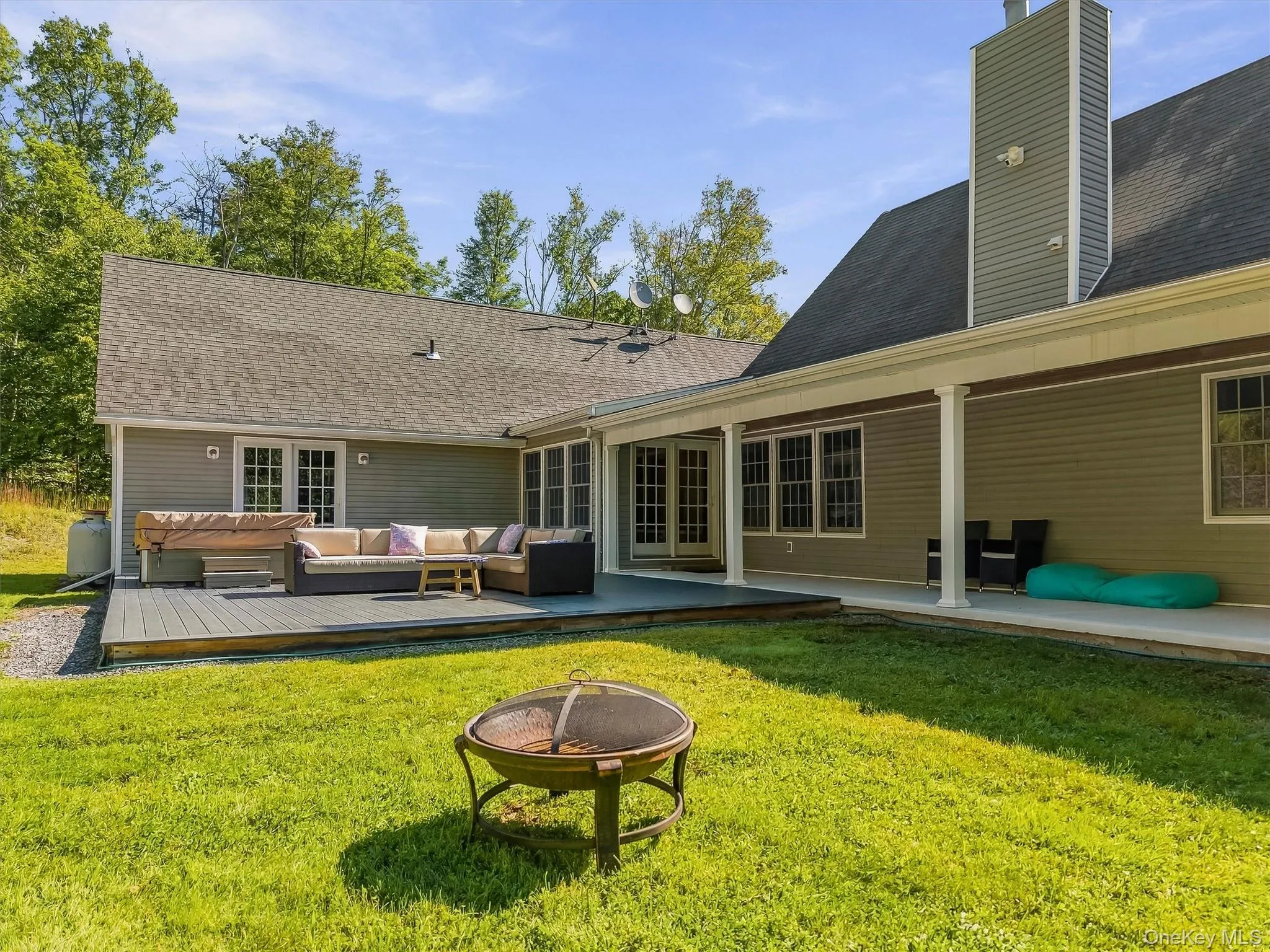 back porch, hot tub sitting area, fire pit back porch, hot tub sitting area, fire pit