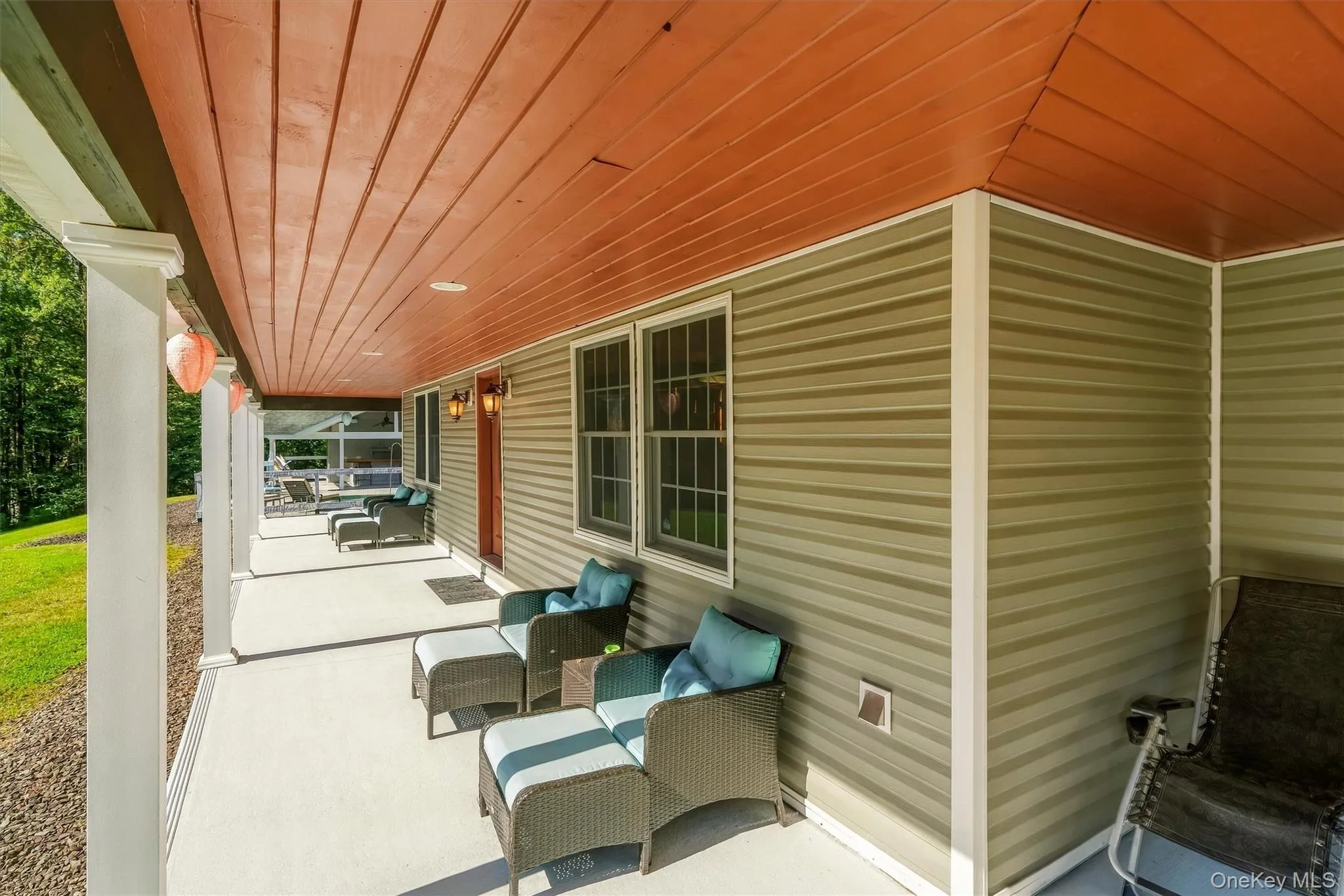 Front porch to pool which wraps around house Front porch to pool which wraps around house