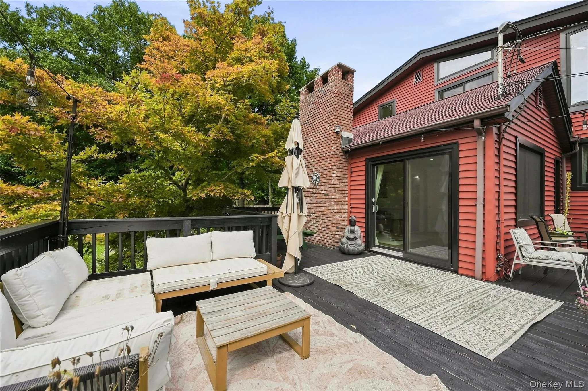Large deck overlooking lake and large yard Large deck overlooking lake and large yard