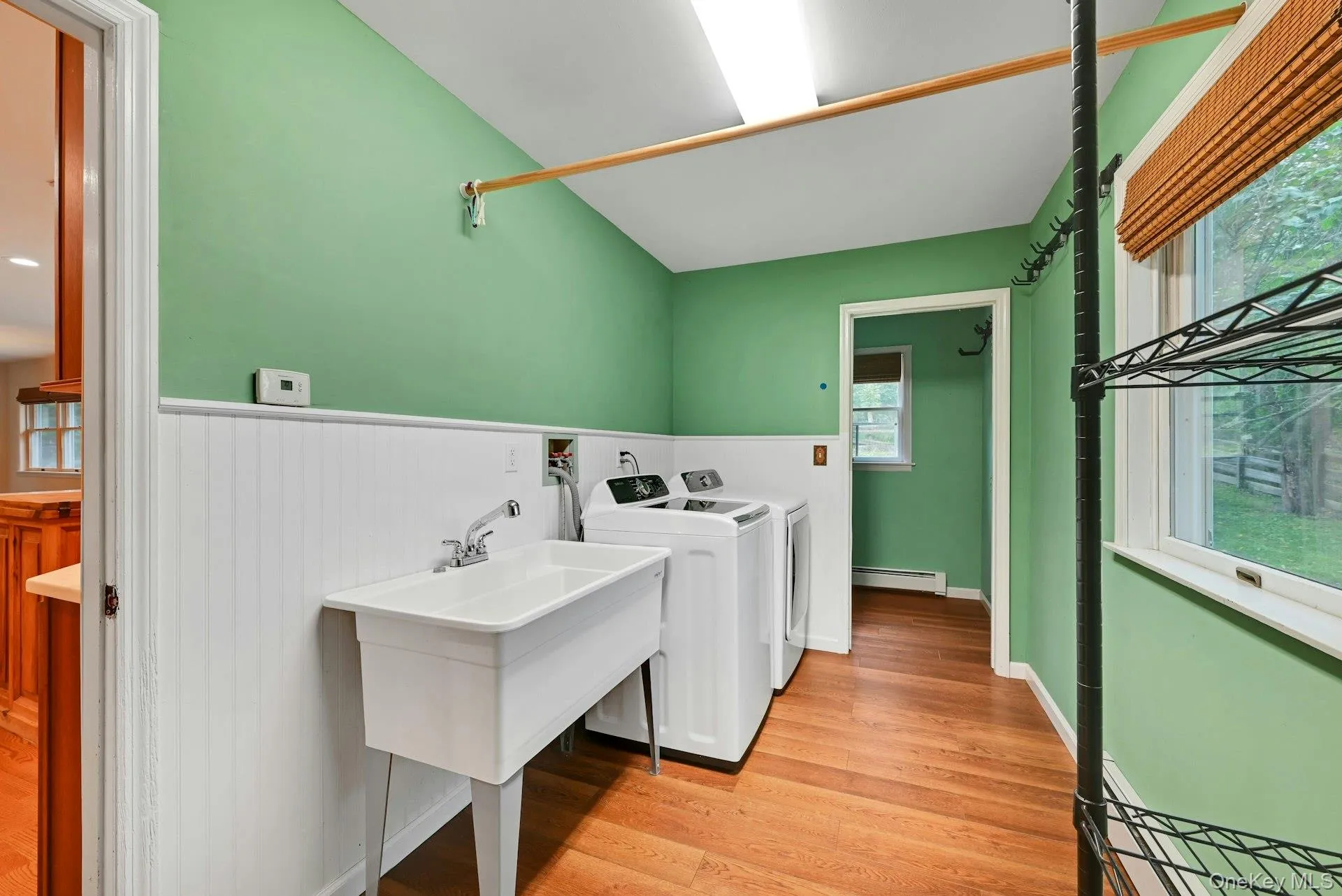 Laundry just off the kitchen with rear yard access - a true mudroom! Laundry just off the kitchen with rear yard access - a true mudroom!
