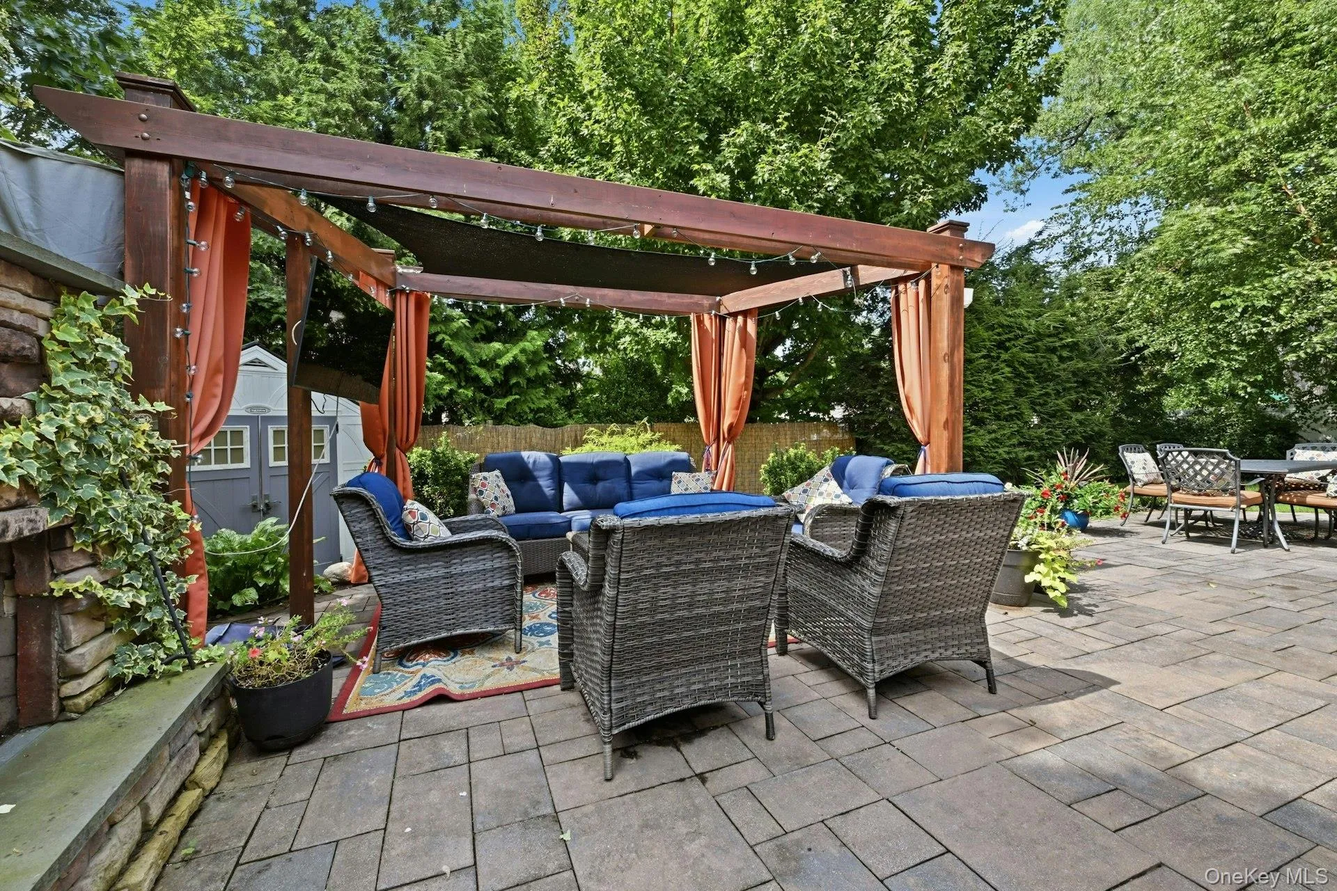 Pergola and Fireplace Lounge Area Pergola and Fireplace Lounge Area