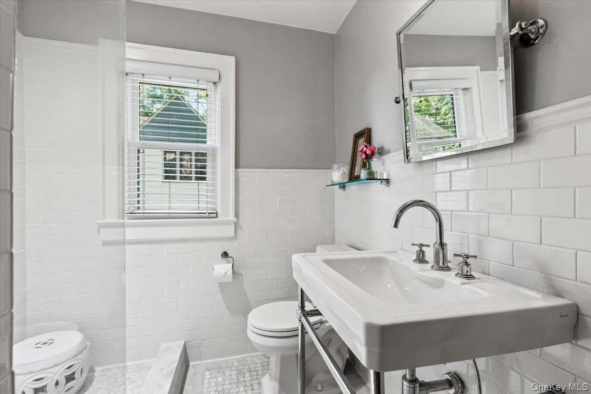Updated full bathroom with classic subway tile Updated full bathroom with classic subway tile