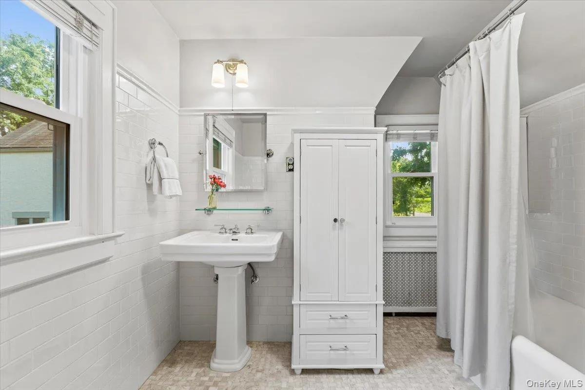 Renovated full bathroom with vintage-inspired details Renovated full bathroom with vintage-inspired details