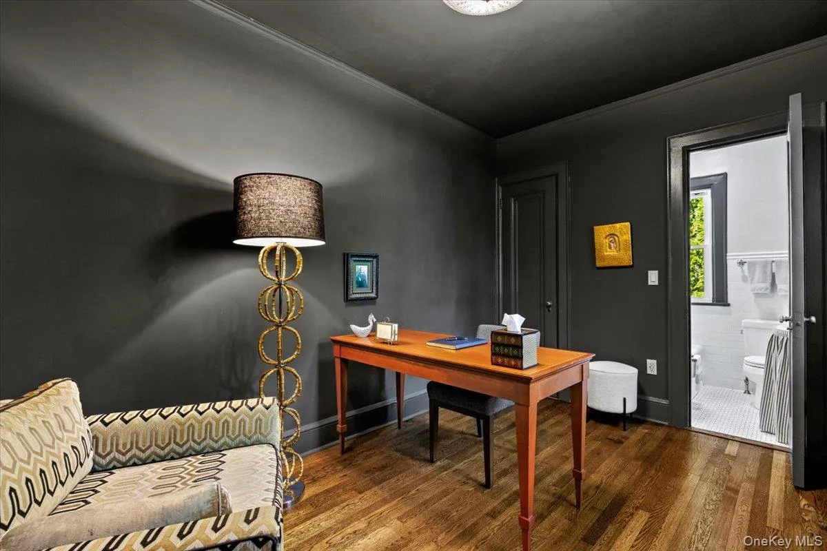 Versatile den or home office with access to a full bathroom Versatile den or home office with access to a full bathroom