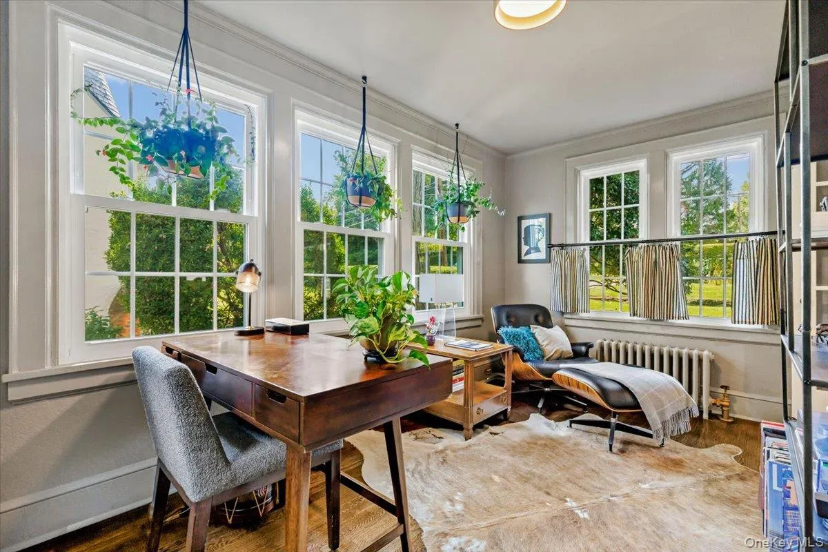 Window-lined sunroom / office overlooking the property Window-lined sunroom / office overlooking the property
