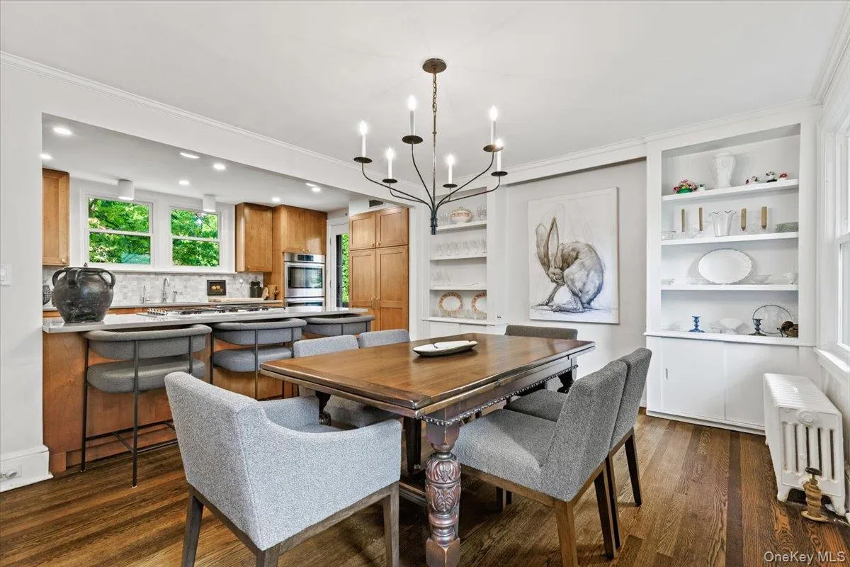 Formal dining room with an open connection to the kitchen Formal dining room with an open connection to the kitchen