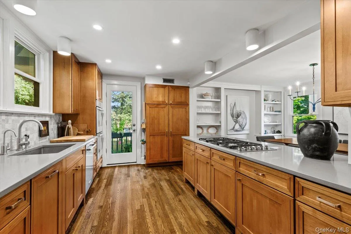 Generous kitchen cabinetry and stone countertops Generous kitchen cabinetry and stone countertops