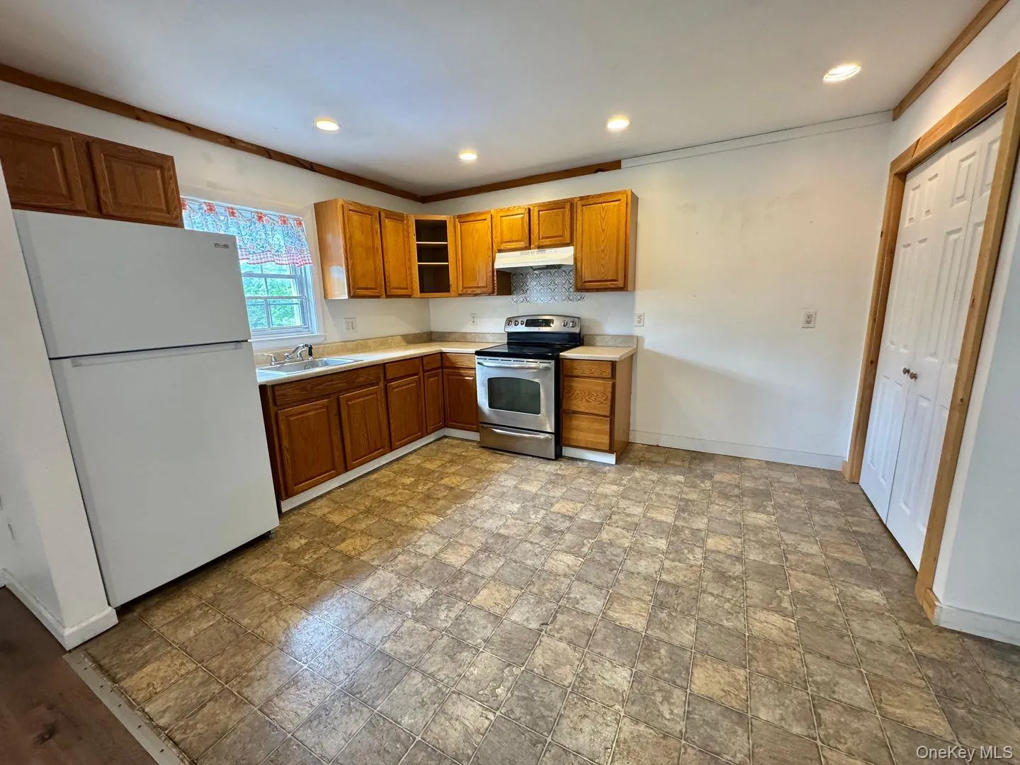 Eat-in kitchen and closet. Eat-in kitchen and closet.
