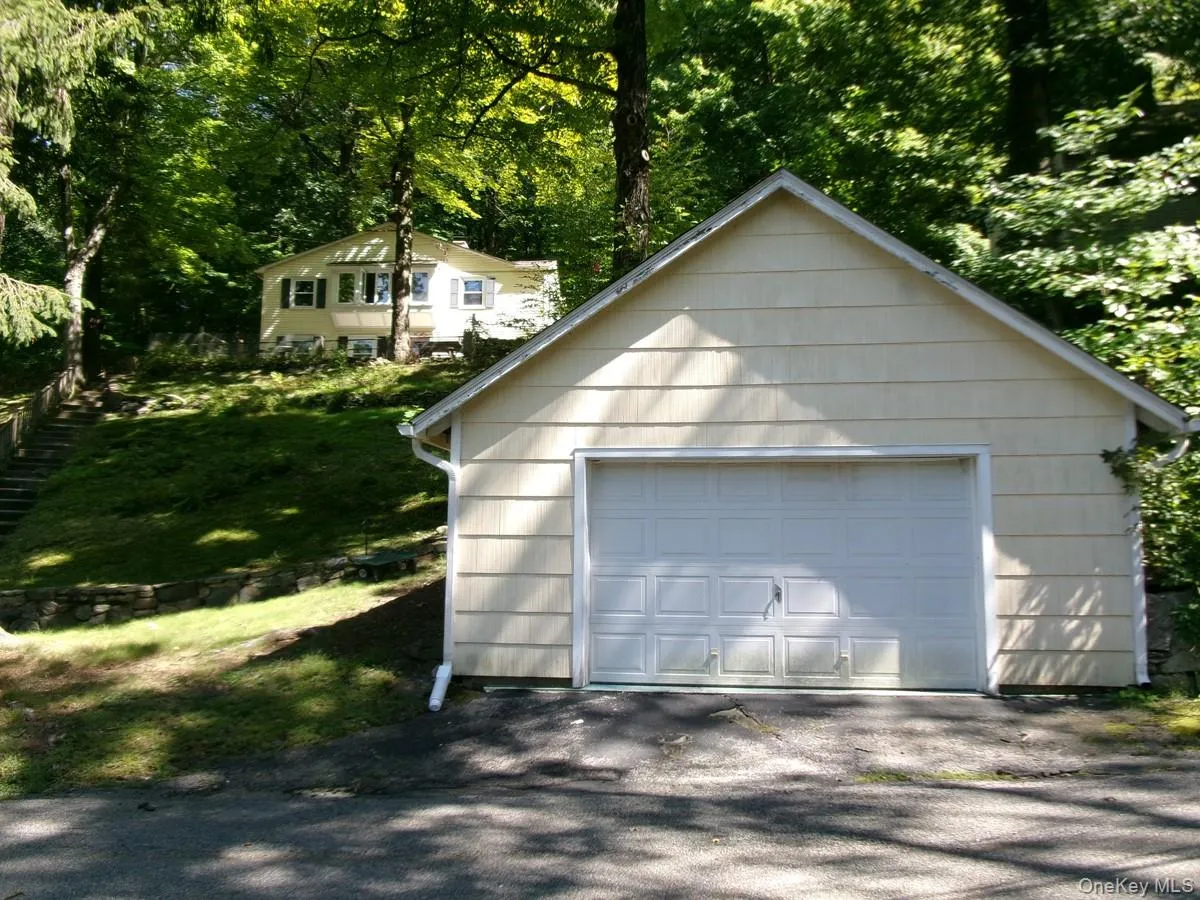 Oversized garage can accommodate one vehicle and also provides storage. Oversized garage can accommodate one vehicle and also provides storage.