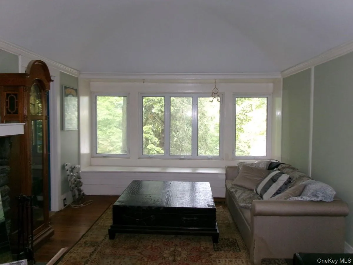 Note the arched, vaulted ceiling in this living room. Note the arched, vaulted ceiling in this living room.