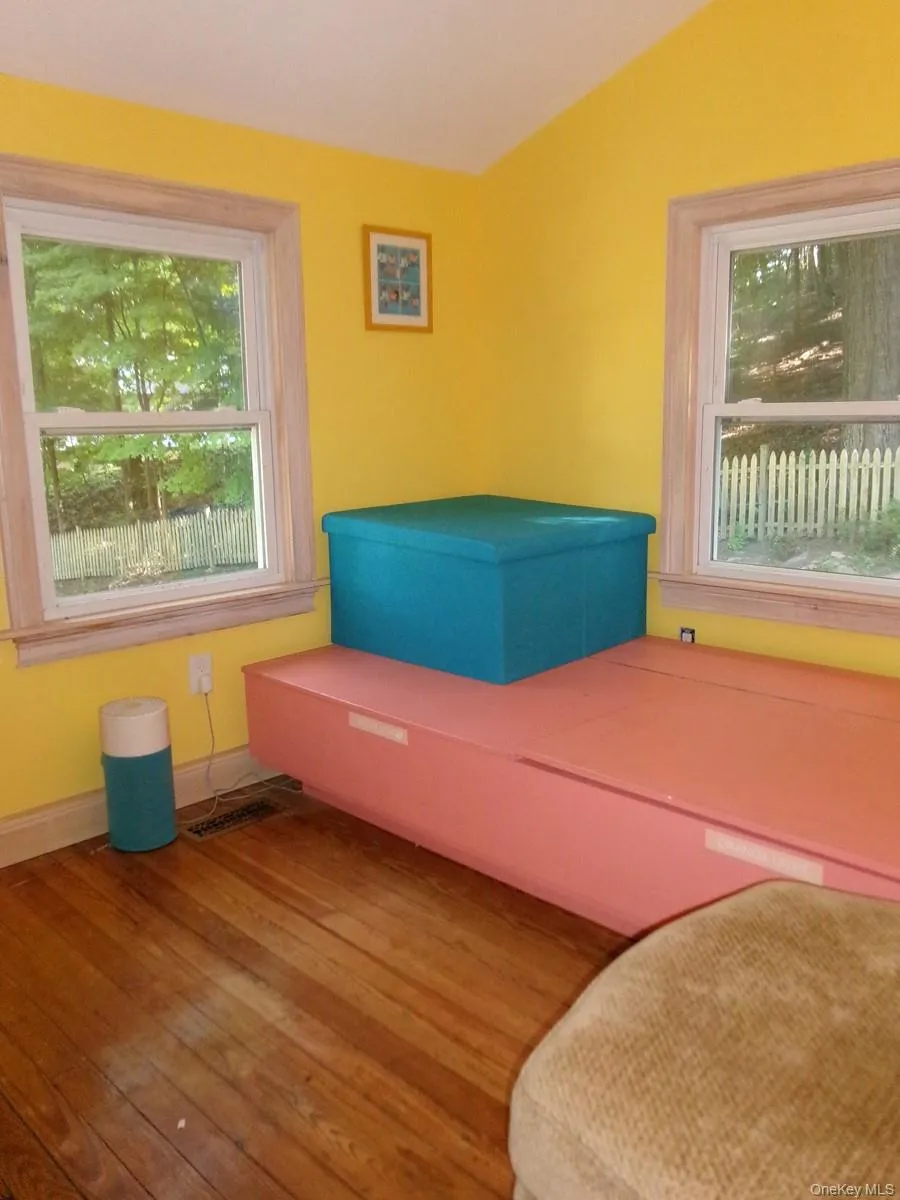The outdoors are clearly visible from this bright bedroom. The outdoors are clearly visible from this bright bedroom.
