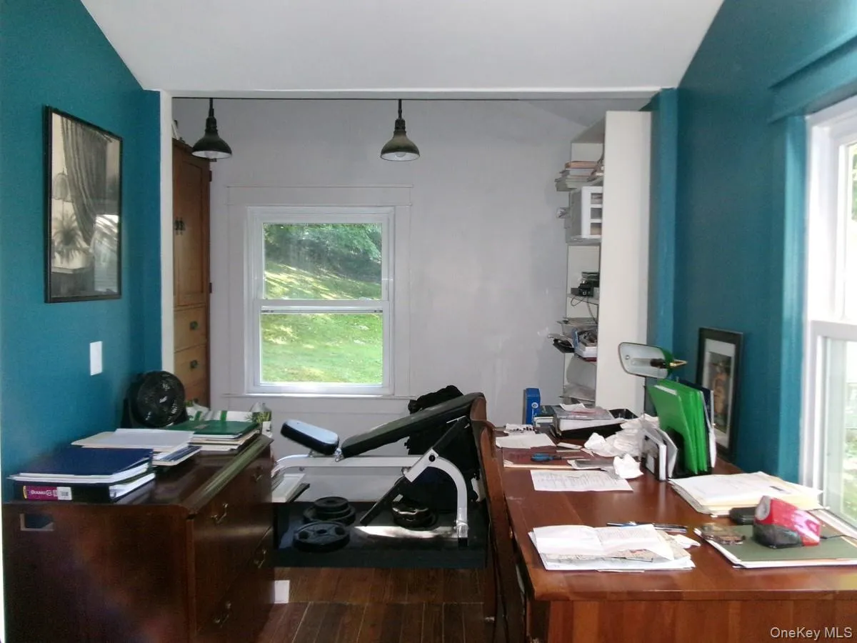 This bedroom is used as an office. This bedroom is used as an office.