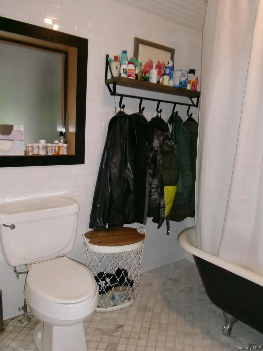 Custom cubbies were built-in to this full bath. Custom cubbies were built-in to this full bath.