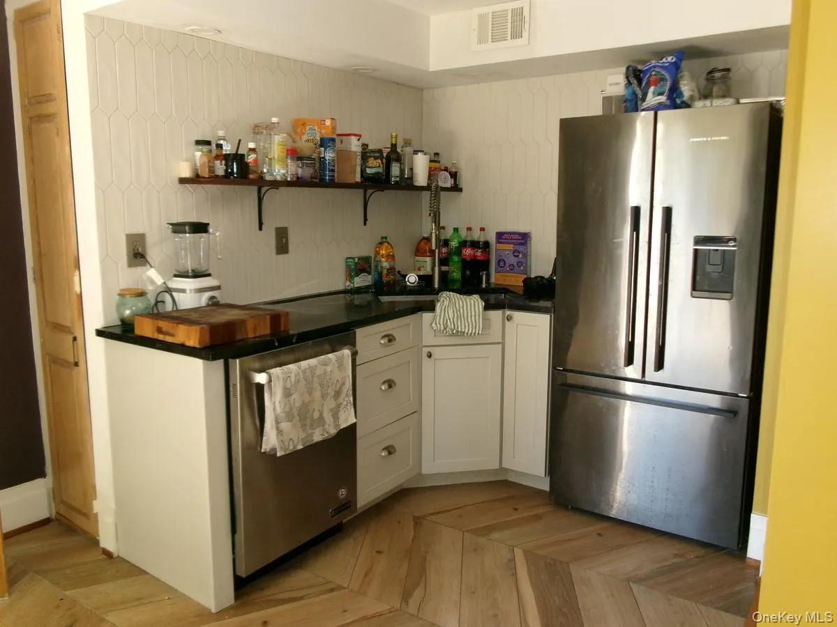 Note the broom closet on the left side. Out of view is a pocket door leading to the Rec Room. Note the broom closet on the left side. Out of view is a pocket door leading to the Rec Room.