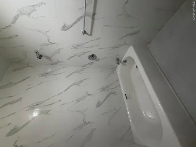 Bathroom has a a great bath tun Bathroom has a a great bath tun