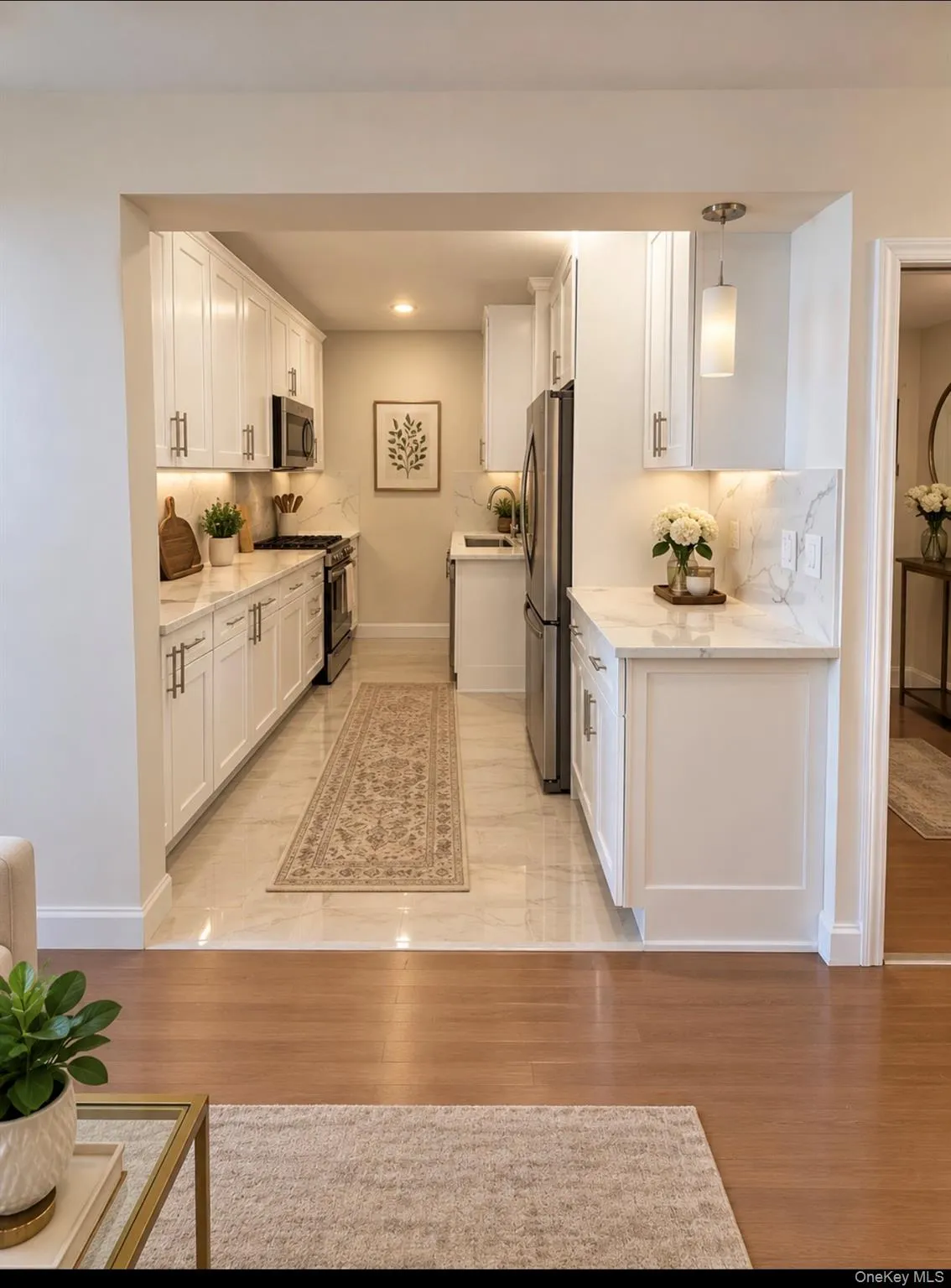 kitchen with white cabinetry and stainless steel appliances - virtually staged kitchen with white cabinetry and stainless steel appliances - virtually staged