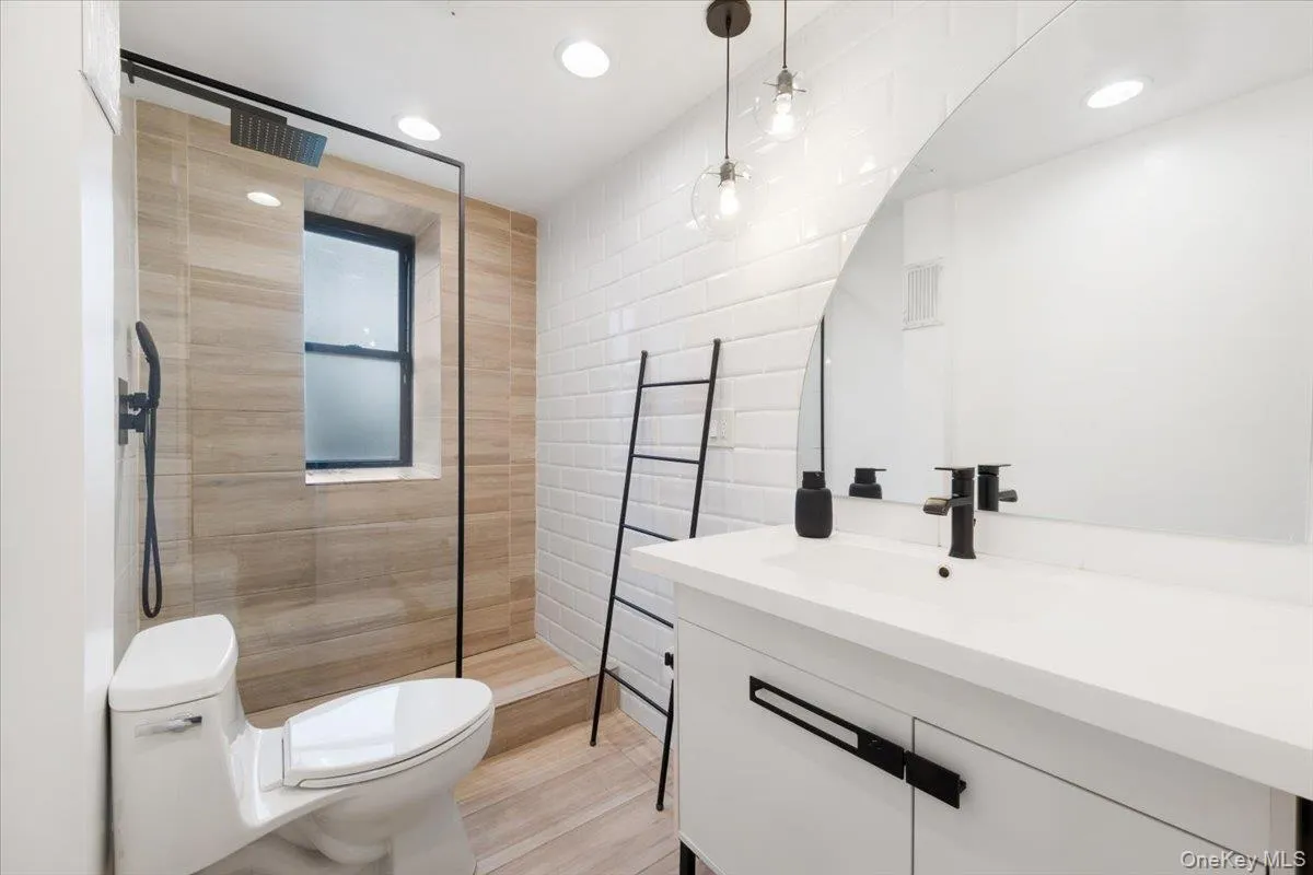 NEWLY renovated full bathroom with walk-in shower and eye catching tile. All new fixtures and tile! NEWLY renovated full bathroom with walk-in shower and eye catching tile. All new fixtures and tile!