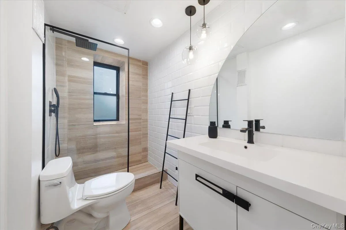 Sleek and modern, this newly renovated bathroom has it all Sleek and modern, this newly renovated bathroom has it all