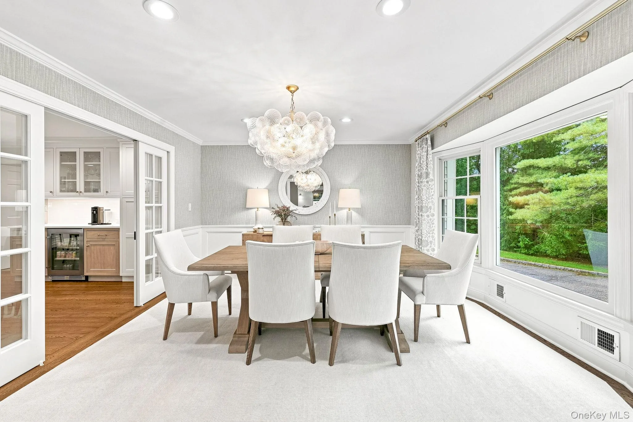 Formal Dining Room with Bay Window and French Doors to Kitchen Formal Dining Room with Bay Window and French Doors to Kitchen