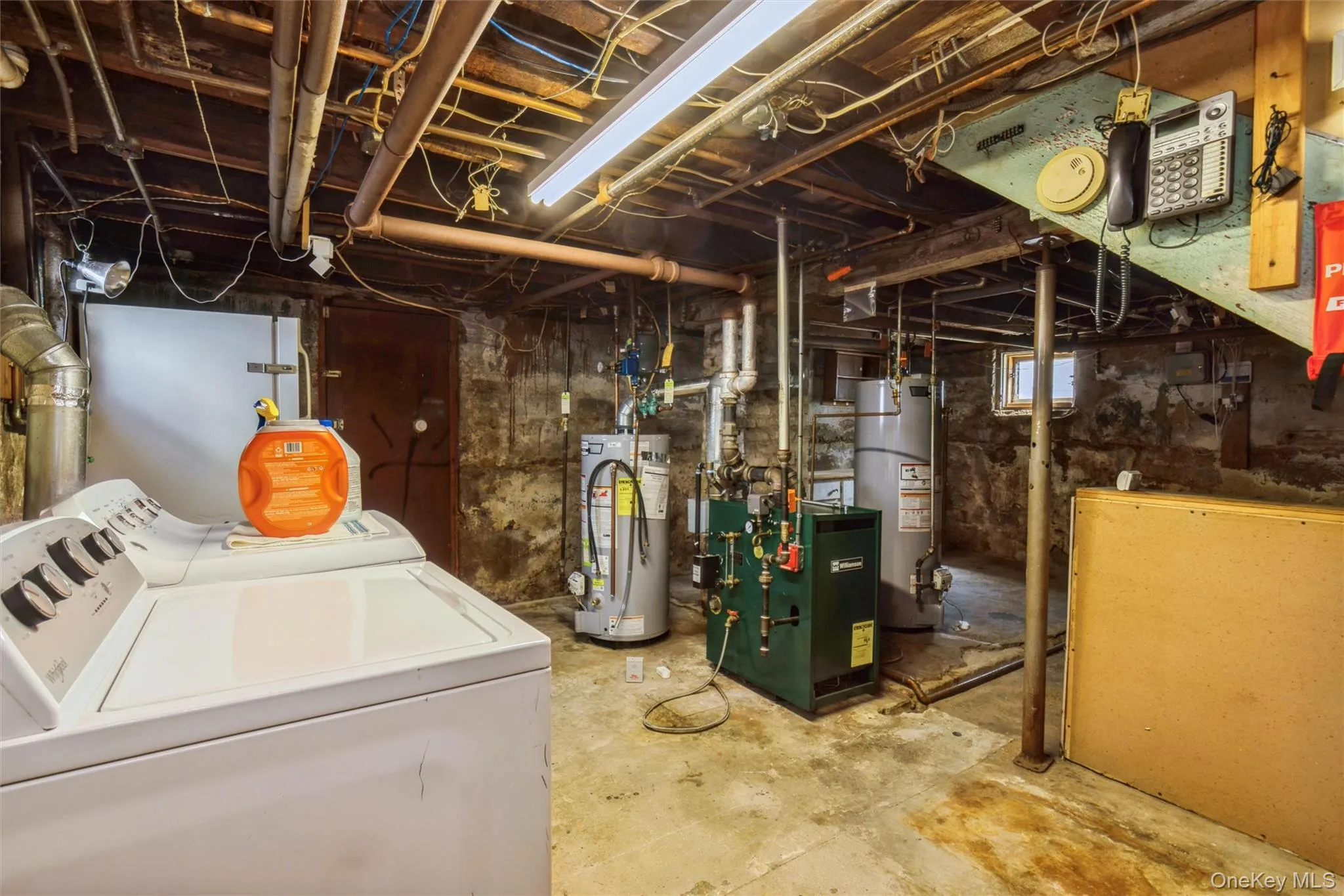 Basement laundry w utillities, 2 hot water heaters, storage Basement laundry w utillities, 2 hot water heaters, storage