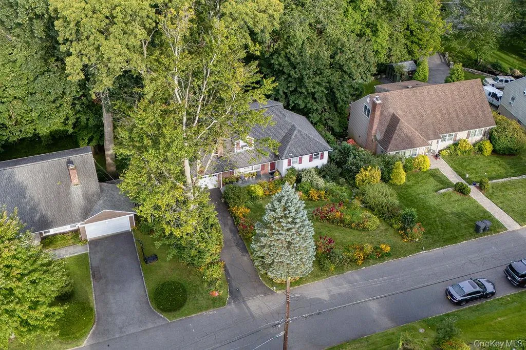 Aerial view of front with long driveway Aerial view of front with long driveway