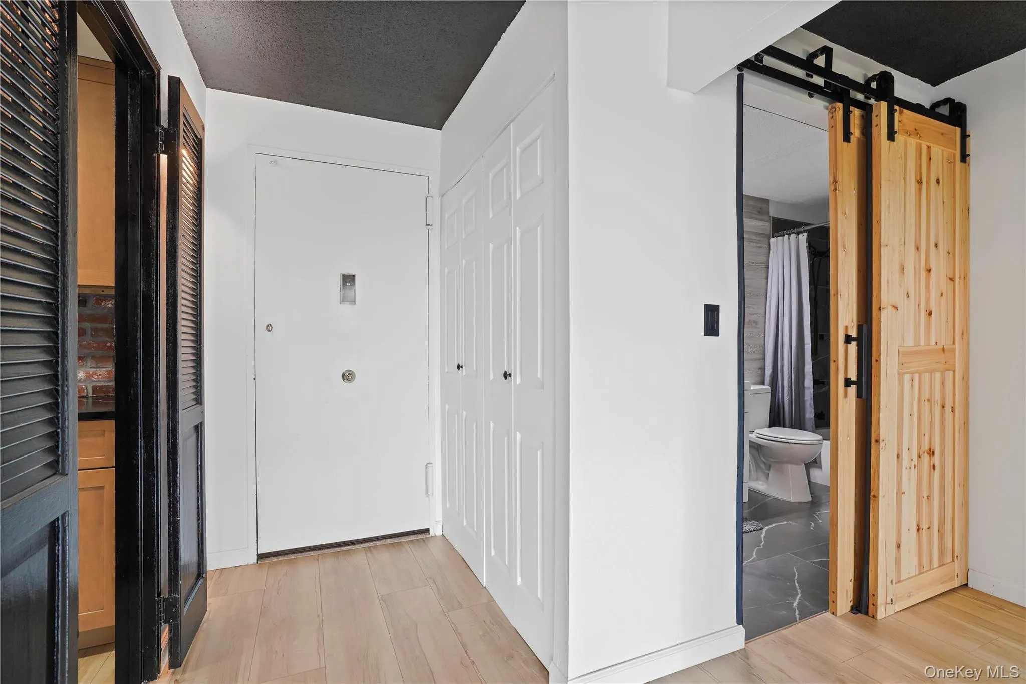 Large coat closet in entranceway Large coat closet in entranceway