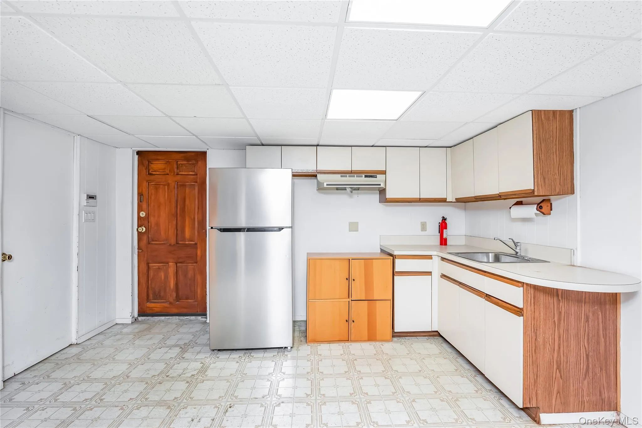 Summer Kitchen in the basement with walk out access to the yard and a potential 4th bedroom Summer Kitchen in the basement with walk out access to the yard and a potential 4th bedroom
