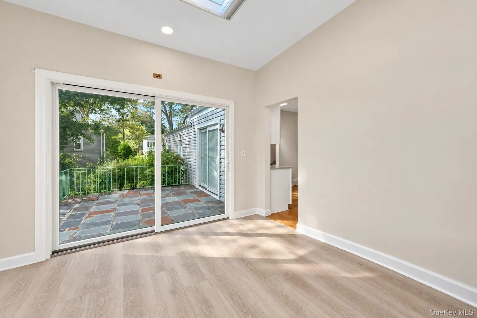 Bright sunroom with sliding doors to the large patio Bright sunroom with sliding doors to the large patio