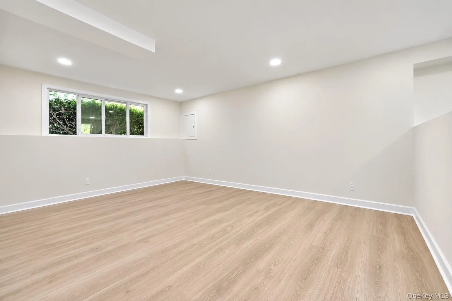 Lower level family room with laundry area walk out to yard.It also has a bathroom with shower Lower level family room with laundry area walk out to yard.It also has a bathroom with shower