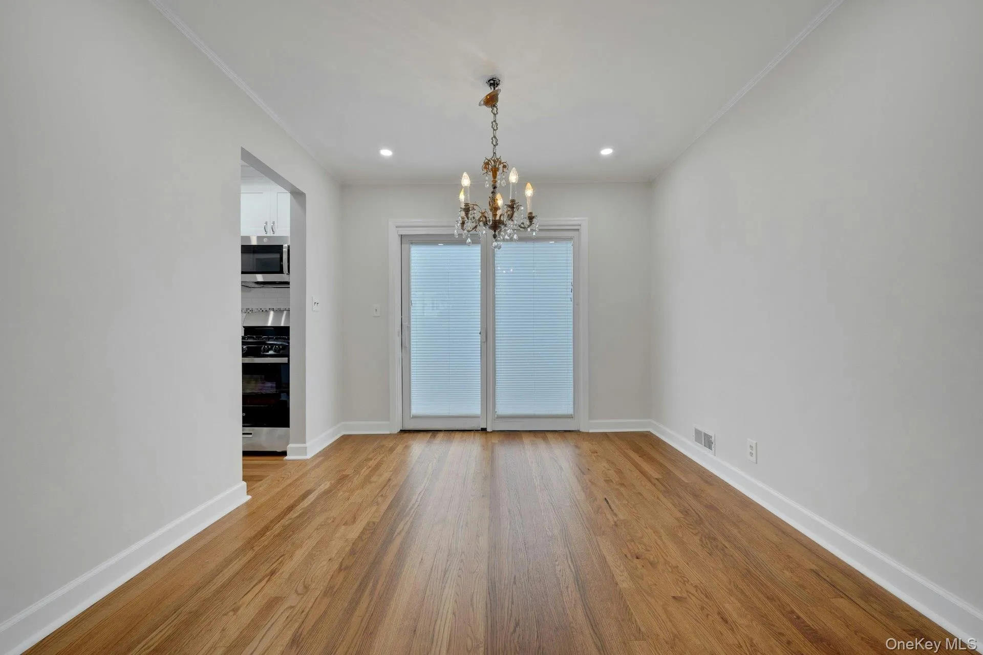 Dining room with sliding doors leading to a large patio Dining room with sliding doors leading to a large patio