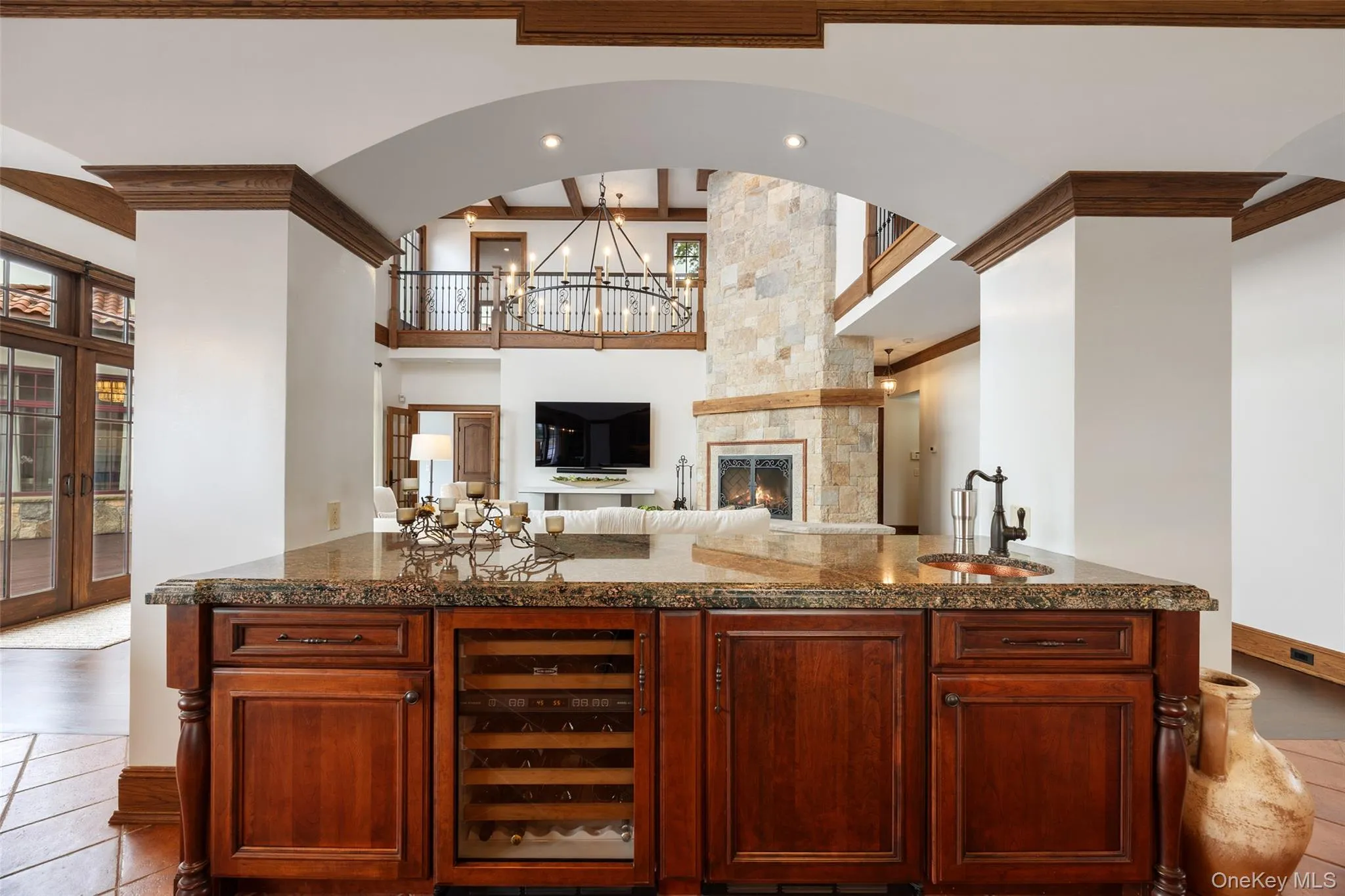 Additional island with storage and wine fridge. Additional island with storage and wine fridge.