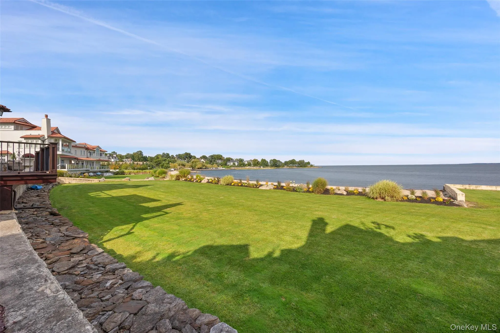 View of yard and beach. View of yard and beach.