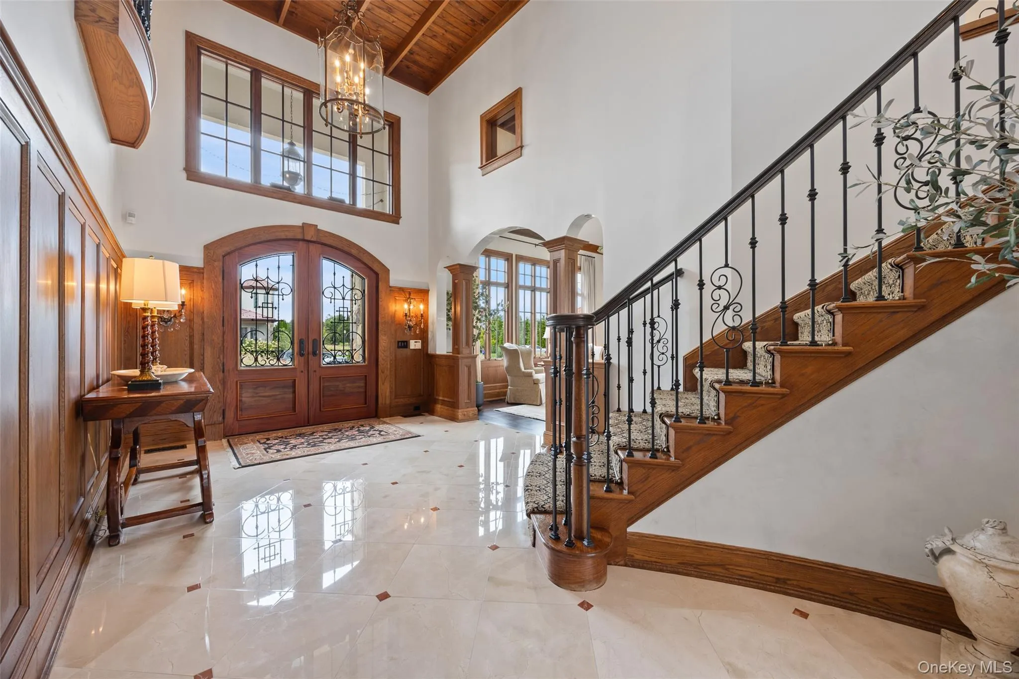 Front entry hall and staircase to second level. Front entry hall and staircase to second level.