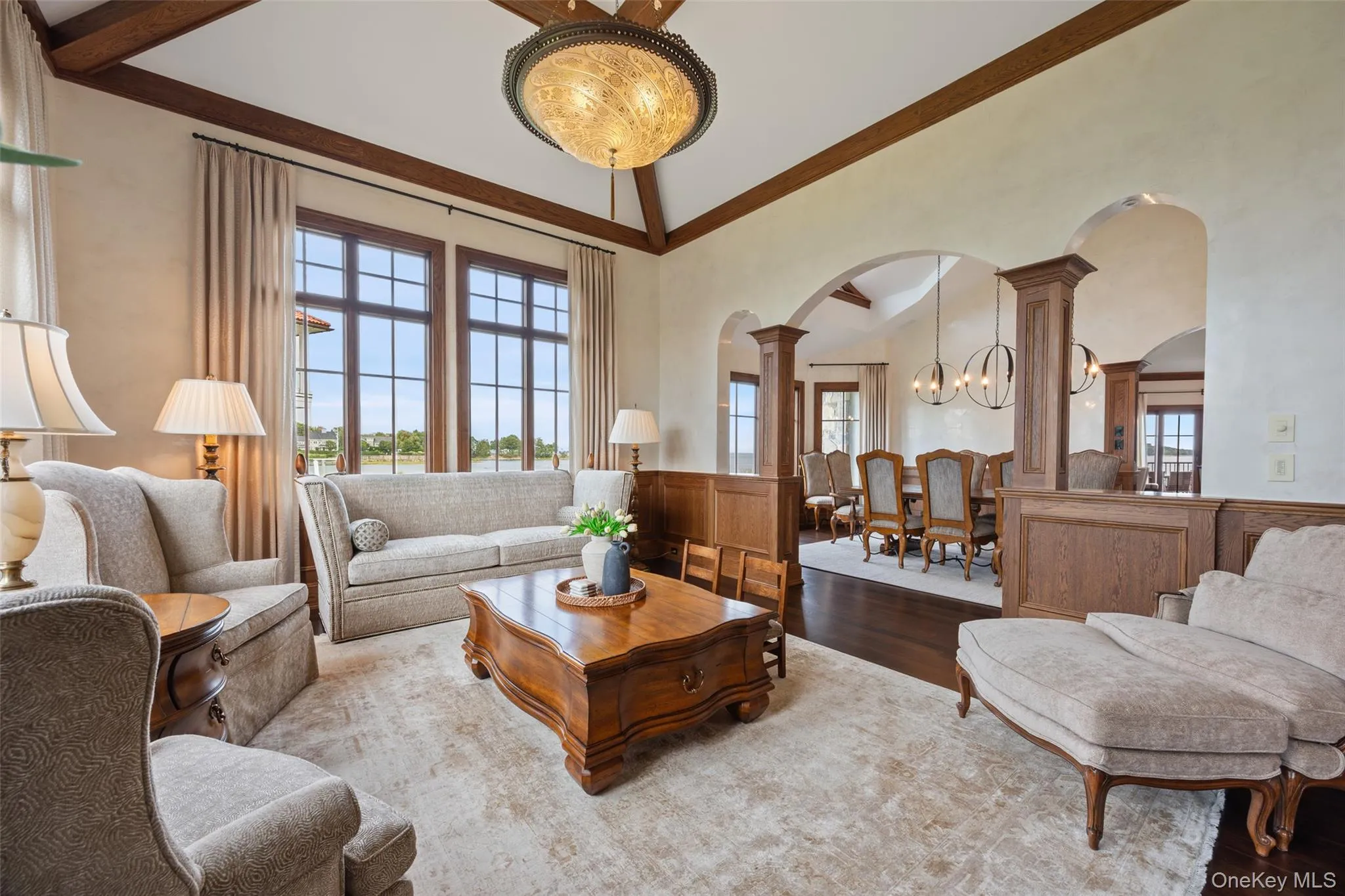 Living room with view of formal dining room. Living room with view of formal dining room.
