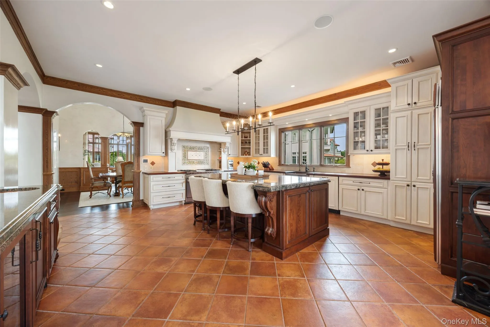 Large eat in kitchen with view of formal dining room. Large eat in kitchen with view of formal dining room.