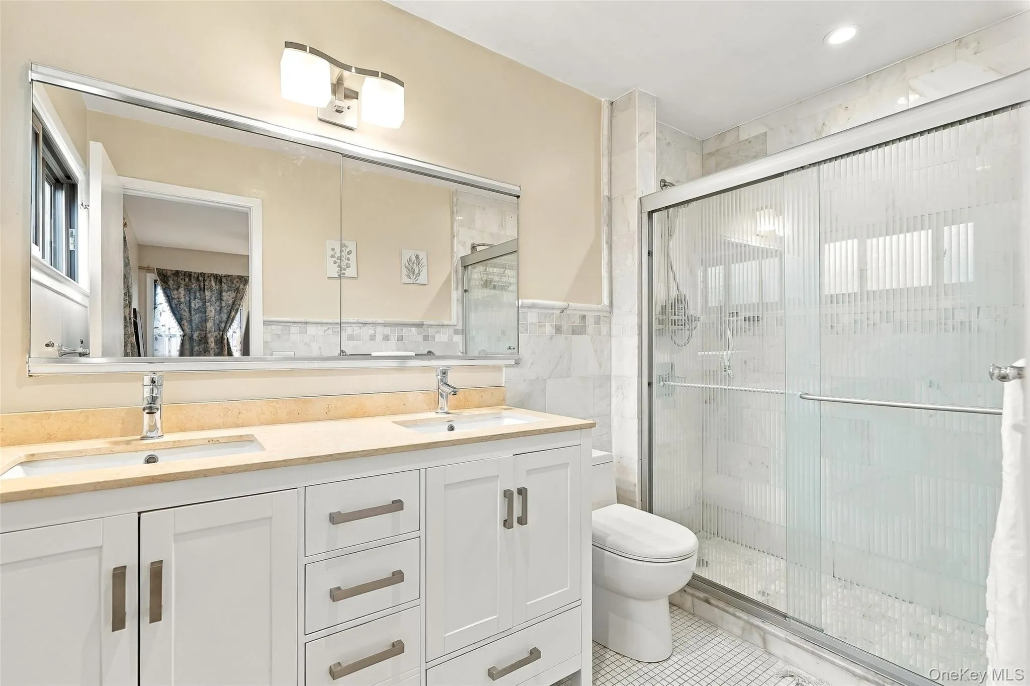 Primary ensuite bathroom with double sink vanity. Primary ensuite bathroom with double sink vanity.