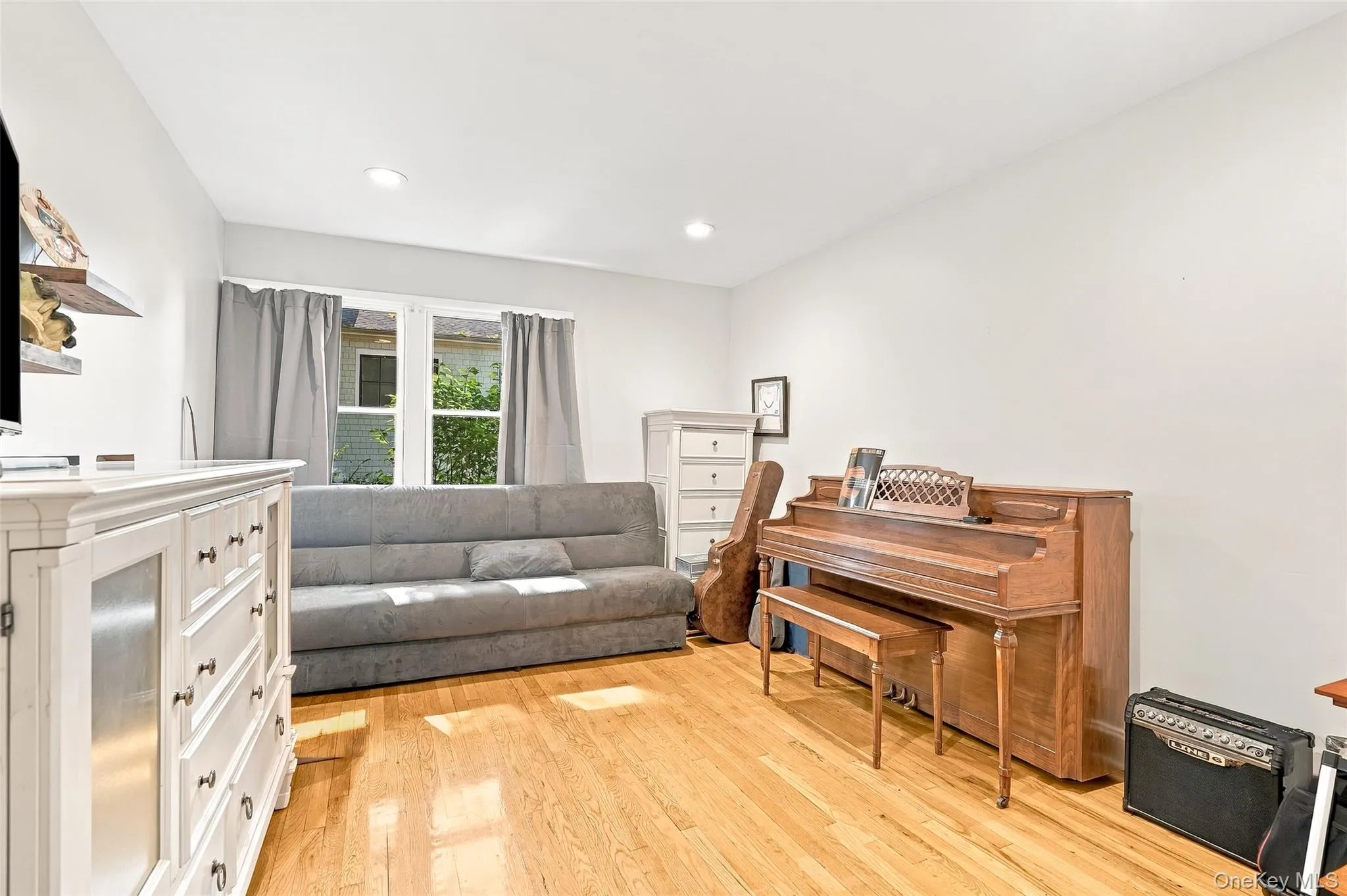 Generously proportioned 2nd bedroom easily transforms into second TV room/Den, Music Room. Generously proportioned 2nd bedroom easily transforms into second TV room/Den, Music Room.