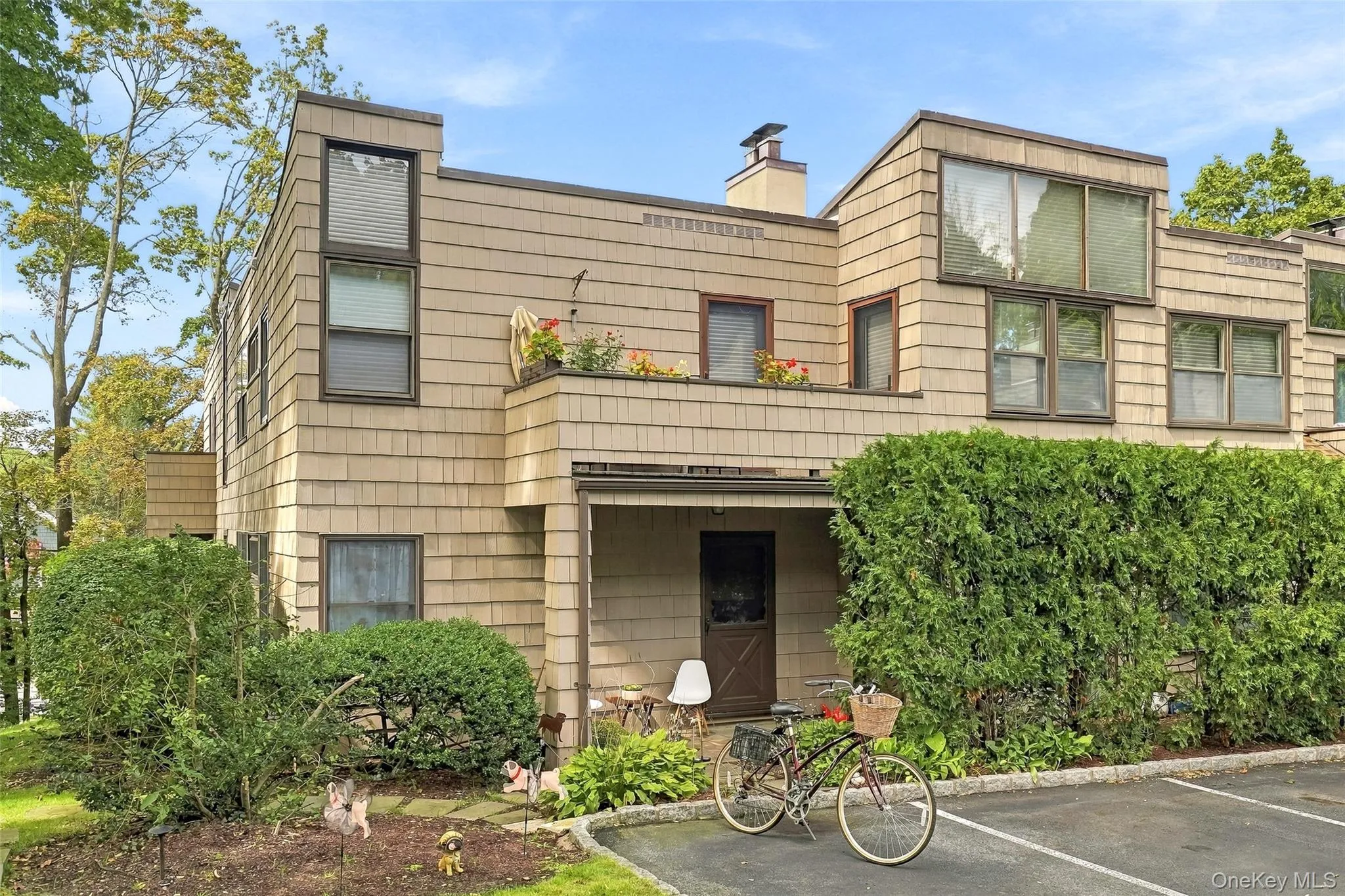 Convenient entry and exit into your one level home on the corner with a designated parking space immediately outside your private entrance. Convenient entry and exit into your one level home on the corner with a designated parking space immediately outside your private entrance.
