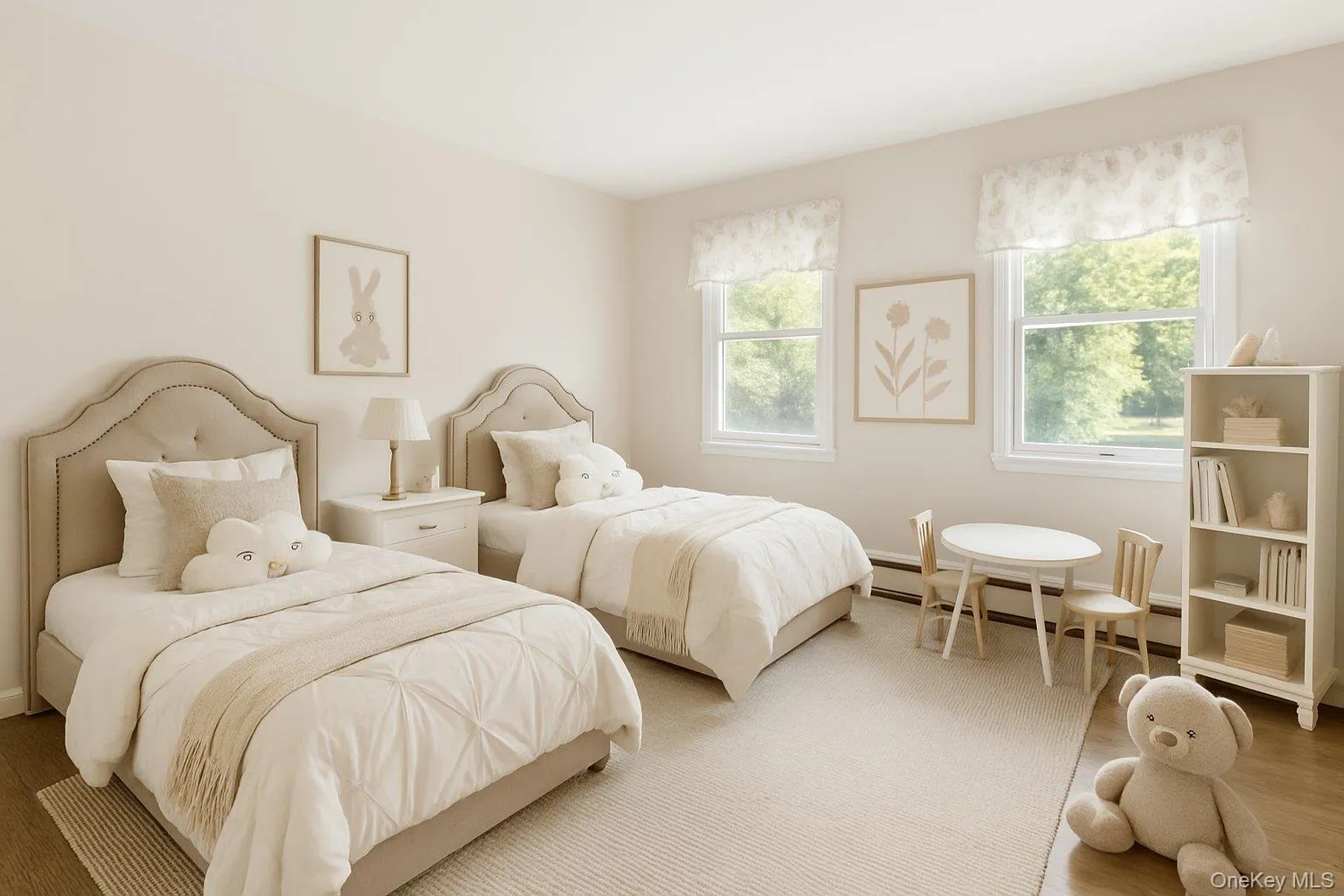 Bedroom featuring wood finished floors and a baseboard radiator Bedroom featuring wood finished floors and a baseboard radiator