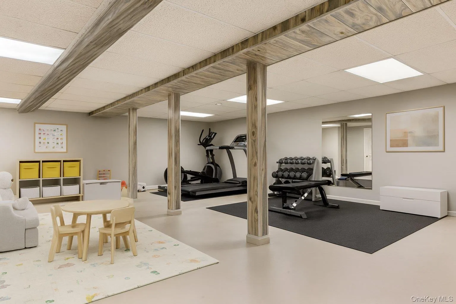 Workout area with a drop ceiling Workout area with a drop ceiling