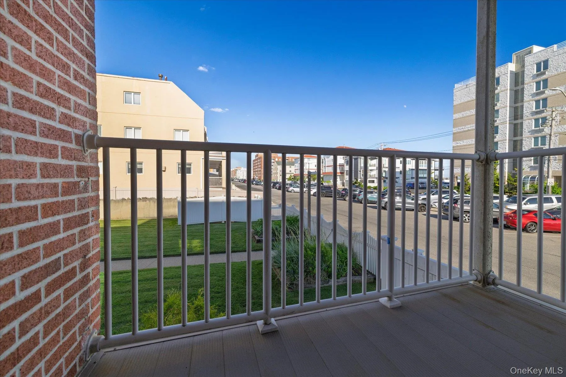 Balcony with ocean and landscaped views Balcony with ocean and landscaped views