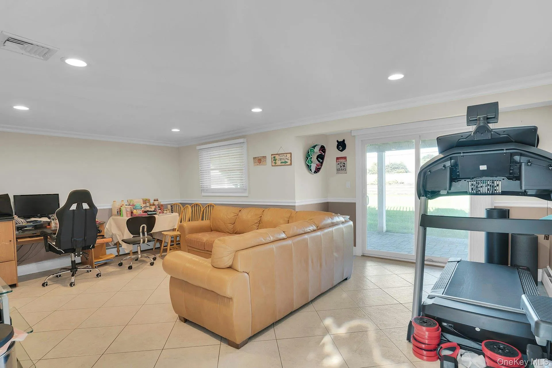 Ground floor family room goes out to yard. Ground floor family room goes out to yard.