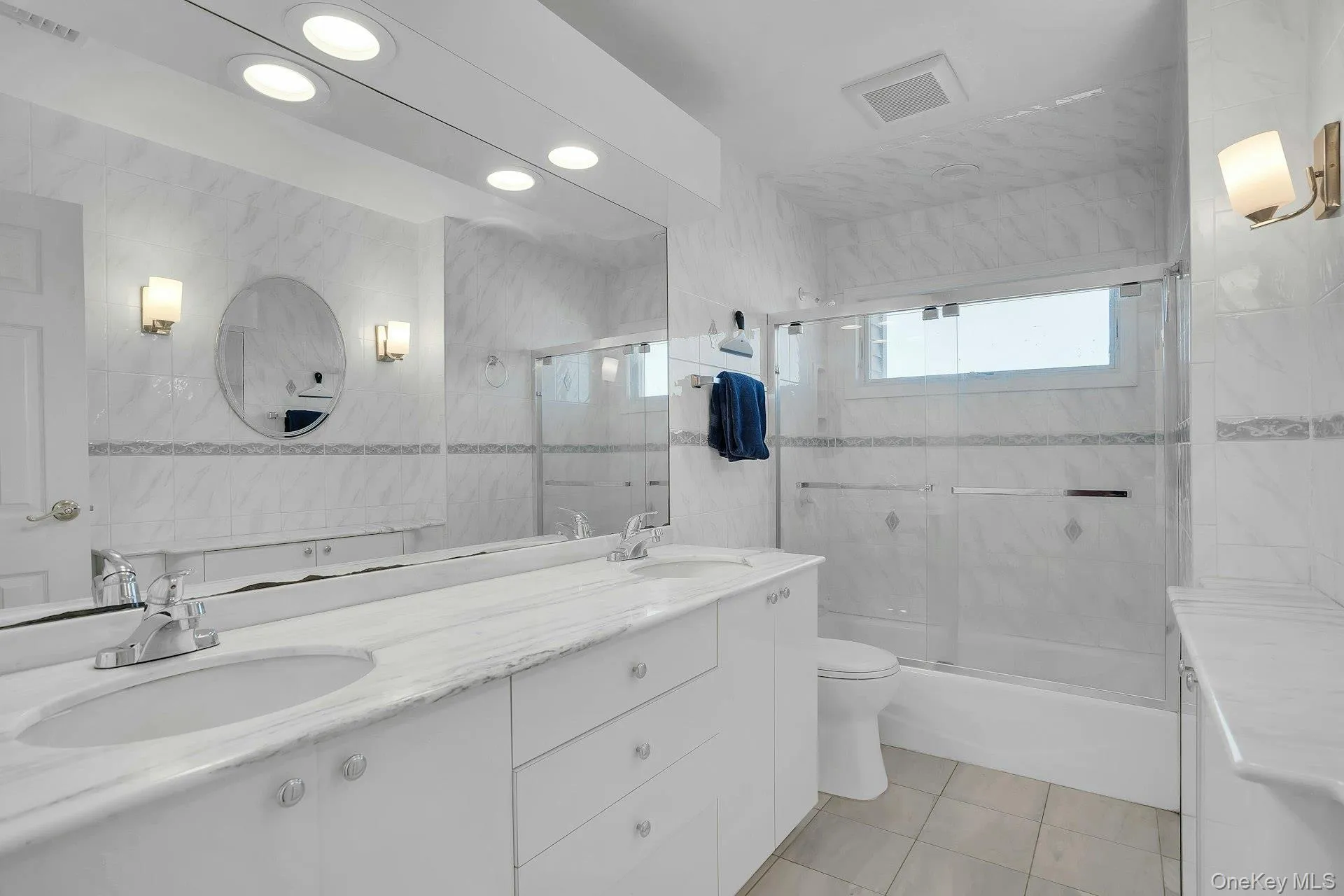 Main bathroom has a double sink. Main bathroom has a double sink.